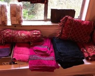 Colorful towels, fancy pillows