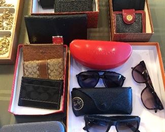 Sunglasses by Valentino, Ray-Ban & Ralph Lauren, wallets by Coach, R. Lauren & more