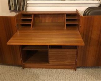 Voila - now it's a desk! (Open it’s 69” L, 34.5” D - doors do not fold back any further)