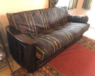 Futon sofa with storage underneath & in the arms (87”L, 40”D, 32”H @ back)