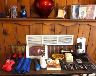 A few sporting goods including hand & ankle weights, vases & more