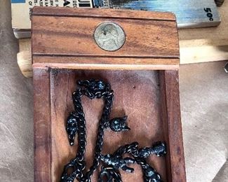 Sm. Vtg. wooden paper holder w/nickel inserted in top -- 2 Vtg. black charm bracelets 