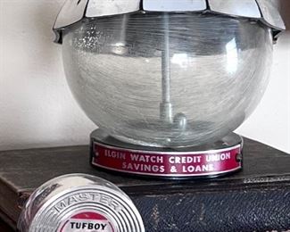 Vtg. Elgin Watch Credit Union Savings & Loans umbrella bank "Save For a Raining Day" and Master Tufboy tape measure 
