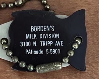 Vtg. Borden's Milk key chain