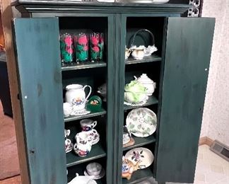 Green painted storage cabinet