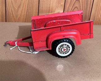 Vtg. pressed steel Hubley orange trailer