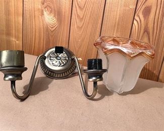 Unused wall scones w/2 frosted glass globes - only 1 shown here - Also has an electric outlet in the center of the wall mount. 10" wide