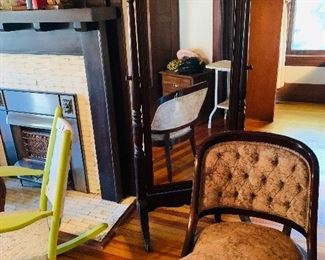 dressing mirror and many antique chairs