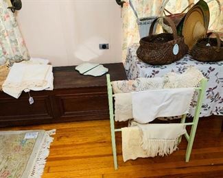 we have two very long  chests and notice just one large pile of handmade linens