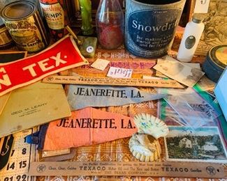 MORE pieces of early Louisiana memorabilia.  Do you see the two Texaco gasoline dip sticks.  They were used before  cars  had gas  gauges.  Do you see the little shells in the front?  From the McGowen Mercantile Store