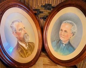 paintings by Charles McGowen of Antoine  Moresi and his wife. 