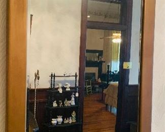 fine  hall mirror and notice the little curio shelf in the reflection