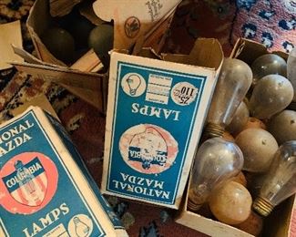 stacks and stacks of early unused still in the boxes of the Mazda light bulbs featured in the calendar 