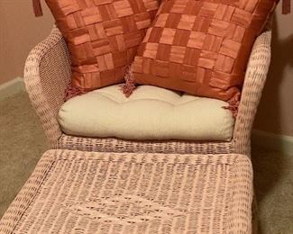 Pink wicker chair and ottoman