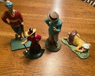 Vintage golf sculptures and doorstops