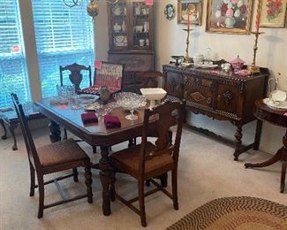Antique Oak dining room table and 4 chairs/leaf, buffet and secretary desk