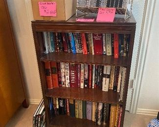 Books, Cds, and DVD's and antique bookcase