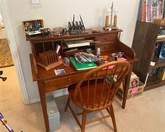 Office desk with chair and office supplies