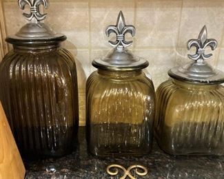 Fleur De Leis topped canisters