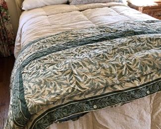 One of several beds - and bedding