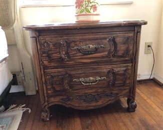 One of two matching nightstands