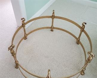 Brass gooseneck coffee table...has glass