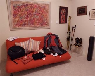 Futon. Snow ski equipment
