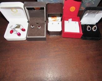 Diamond studs and ruby earrings