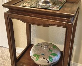Small occasional table plus Asian themed decor.