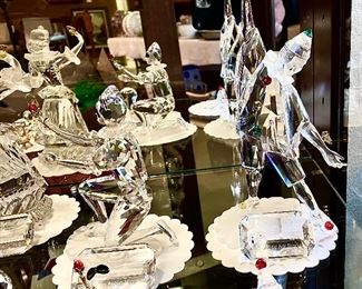 Nice grouping of Swarovski Club Crystal Figurines.