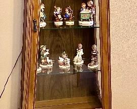 Scarce Mid Century Modern Asymmetrical Glass cabinet in Excellent condition.