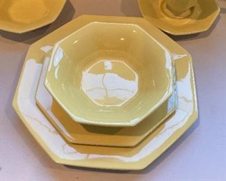 12 place settings plus serving pieces. Total of 72 pieces.