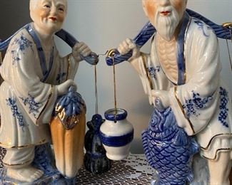 Vintage Oriental Man and Woman carrying buckets and fish