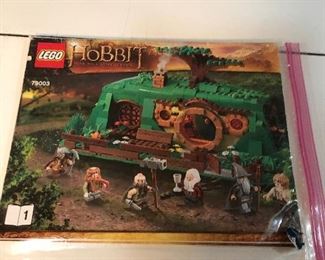 LEGO # 79003 "An Unexpected Gathering" - has been taken apart and sealed in the box. The following photos show it in a completed state.