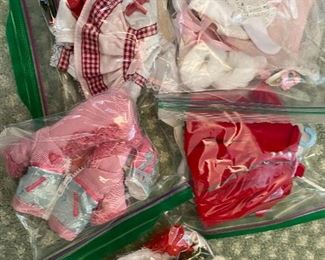 Bags of doll clothing