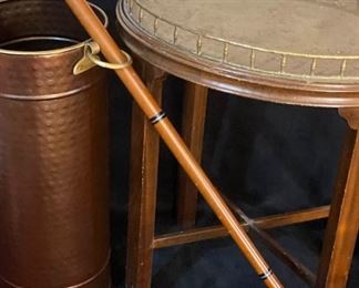 131 Small round side table, umbrella stand and walking stick