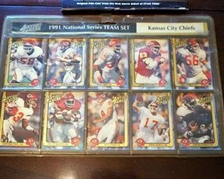 Star Trek Captain Kirk Cels Original Package, 1994 Guinan Pewter Figure, 1991 National Series Trading Card Team Set, And Joe Montana Chiefs