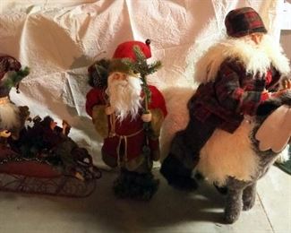 Christmas Santa's Including Santa In Metal Sleigh With Elf, Standing Santa And Santa Riding Moose