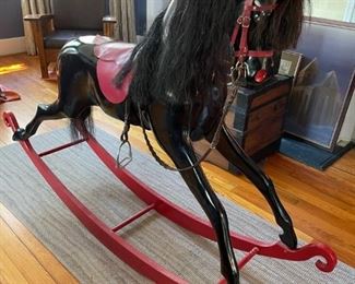 Haddon Rocking Horse, England.  Quite a rarity for one of the earlier larger ones.  Used in a modelling studio many years ago.