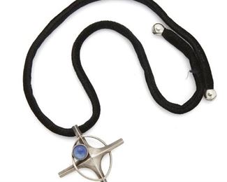3
An Antonio Pineda Sterling Silver And Synthetic Star Sapphire Pendant
1962-1963; Taxco, Mexico
Stamped with crown mark for Antonio Pineda; Further stamped: Los Castillo / Soc Coop Scl Sec 2 / 970 / Hecho en Mexico / [Eagle 3]
Comprising a modernist cross-style pendant set with a round synthetic star sapphire suspended on a fixed black velvet cord with silver spherical tips
Pendant: 2.625" L x 2.375" W; Cord: 27" L
41 grams gross
Estimate: $600 - $800