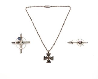 7
A Group Of Antonio Pineda Sterling Silver And Gemstone Jewelry
Three works:

An obsidian Maltese cross pendant on attached neck chain
Post-1953; Taxco, Mexico
Crown mark for Antonio Pineda; Further stamped: [Eagle 17] / Hecho en Mexico / Silver / 970
19" L x 1.5" H

A modernist cross pendant set with a synthetic star sapphire
Post-1953; Taxco, Mexico
Crown mark for Antonio Pineda; Further stamped: [Eagle 208] / JVL / Taxco
2" L x 2.25" W

An arrow brooch with starburst rays, set with a round synthetic color change sapphire
Post-1953; Taxco, Mexico
Crown mark for Antonio Pineda; Further stamped: 970
1.125" L x 2.5" W

3 pieces
65.5 grams gross
Estimate: $800 - $1,200