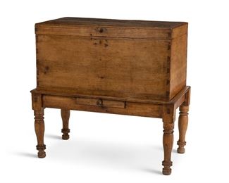 11
A Guatemalan Wood Dowry Chest
Circa 1940s; Guatemala
The lidded wood chest raised on a stand with a single drawer, 2 pieces
Chest: 20" H x 39.5" W x 21" D; On stand: 40.25" H x 42.5" W x 22.25" D
Estimate: $500 - $700