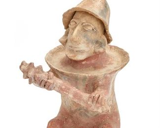 33
A Pre-Columbian Jalisco Ceramic Figure
Circa 150 BCE-250 CE
The earthenware figure depicting a seated warrior wielding a club and wearing striped armor and helmet
13.5" H x 7" W x 9" D
Estimate: $750 - $1,000