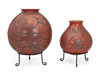 51
Two Mata Ortiz Pottery Jars
Two works:

A large Gloria Hernandez pottery jar
20th Century; Mata Ortiz, Mexico
Signed: Gloria Hernandez
The black-on-red pottery jar with geometric motifs on custom raised metal stand
Jar: 14" H x 14" Dia.

A large Nicolas Silveira pottery jar
20th Century; Mata Ortiz, Mexico
Signed: Nicolas Silveira
The black-on-red pottery jar with geometric motifs on custom raised metal base
Jar: 10" H x 11" Dia.

2 pieces
Estimate: $400 - $600