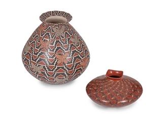 52
Two Mata Ortiz Pottery Vessels
Two works:

An Efren Ledezma vessel
Late 20th/Early 21st Century; Mata Ortiz, Mexico
Signed: Efren Ledezma
The bulbous, ovoid jar with polychrome moth motif and all-over geometric field
9" H x 8" Dia.

A Yolanda "Yoly" Ledezma vessel
20th Century; Mata Ortiz, Mexico
Signed: Yoly Ledezma
The squat, wide-shouldered jar with black geometric motif and sgraffito ants on a burnished red slip glaze
4" H x 6.5" Dia.

2 pieces
Estimate: $300 - $500