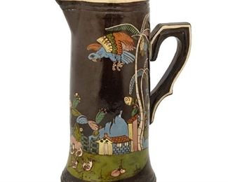 60
A Tlaquepaque Pottery Pulque Pitcher
Circa 1920s; Tlaquepaque, Mexico
The polychrome glazed pottery pitcher with a hen and chicks
11.5" H x 8" W x 6" D
Estimate: $400 - $600