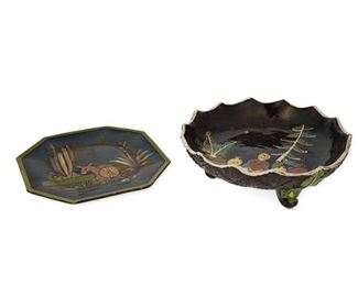 63
Two Tlaquepaque Pottery Serving Pieces
Two works:

A tripod bowl
Circa 1930s; Tlaquepaque, Mexico
The glazed pottery bowl with a polychrome campesino scene on the interior and vines and acanthus leaves on the exterior
4" H x 10.5" Dia.

A Josefina Arias serving plate
Circa 1925-1935; Tlaquepaque, Mexico
Marked: Arias / Made in Mexico
The octagonal glazed pottery plate with burro, agave, and cactus scene
9.75" W x 9.75" D

2 pieces
Estimate: $300 - $500