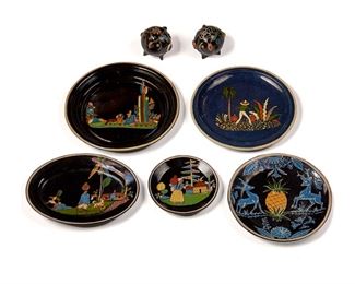 62
A Group Of Tlaquepaque Campesino Pottery Serving Items
Circa 1920s-1940s; Tlaquepaque, Mexico
Three marked: Mexico
Each decorated with glazed, polychrome campesino motifs, comprising an oval platter (11.125" W x 8.5" D), a small salad plate (7" Dia.), a charger attributed to Baxter with campesino and cactus (12" Dia.), a cobalt blue charger with campesino carrying water (11.25" Dia.), a charger with antelope and a pineapple (10.25" Dia.), and pig-form salt and pepper shakers with floral decoration (each: 3.75" H x 3.25" W x 3.5" D approximately), 7 pieces
Estimate: $200 - $400