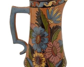 64
A Tlaquepaque Pottery Pulque Pitcher, Attributed To Balbino Lucano
Circa 1920; Tlaquepaque, Mexico
Marked: Mexico
Attributed to Balbino Lucano (1892-1964, Mexican), the glazed pottery pitcher with polychrome campesino and floral motifs bordered by Aztec-style banding at the rim and base
11.75" H x 8.75" W x 6.25" D
Estimate: $400 - $600