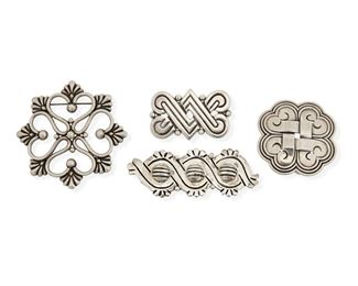 75
A Group Of Héctor Aguilar Silver Brooches
1940-1945 and 1955-1962; Taxco, Mexico
Each stamped for Héctor Aguilar; Each further stamped: Taxco / 940; Knot brooch stamped: [Eagle 9]
Comprising a woven knot brooch (2" Dia.), a sculpted floral wire brooch (2.5" Dia.), a three-ball brooch (1.125" H x 3" W), and an interlaced "V" motif brooch (1.25" H x 1.875" W)

4 pieces
95.5 grams gross
Estimate: $500 - $700